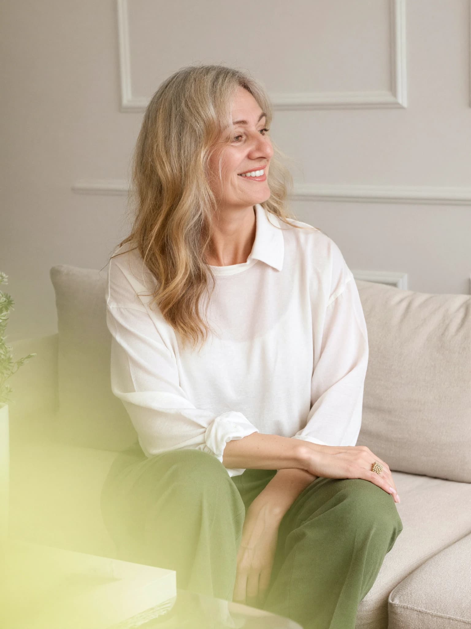 Teri Spinks, counsellor and psychotherapist, sitting in her practice